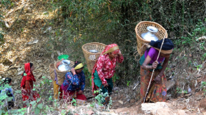 Women and children carry water several times a day.